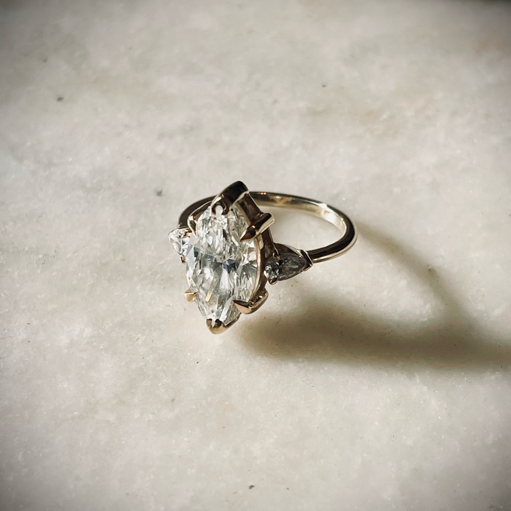 3.53 Ct lab grown Marquise Diamond Ring with pear baguettes